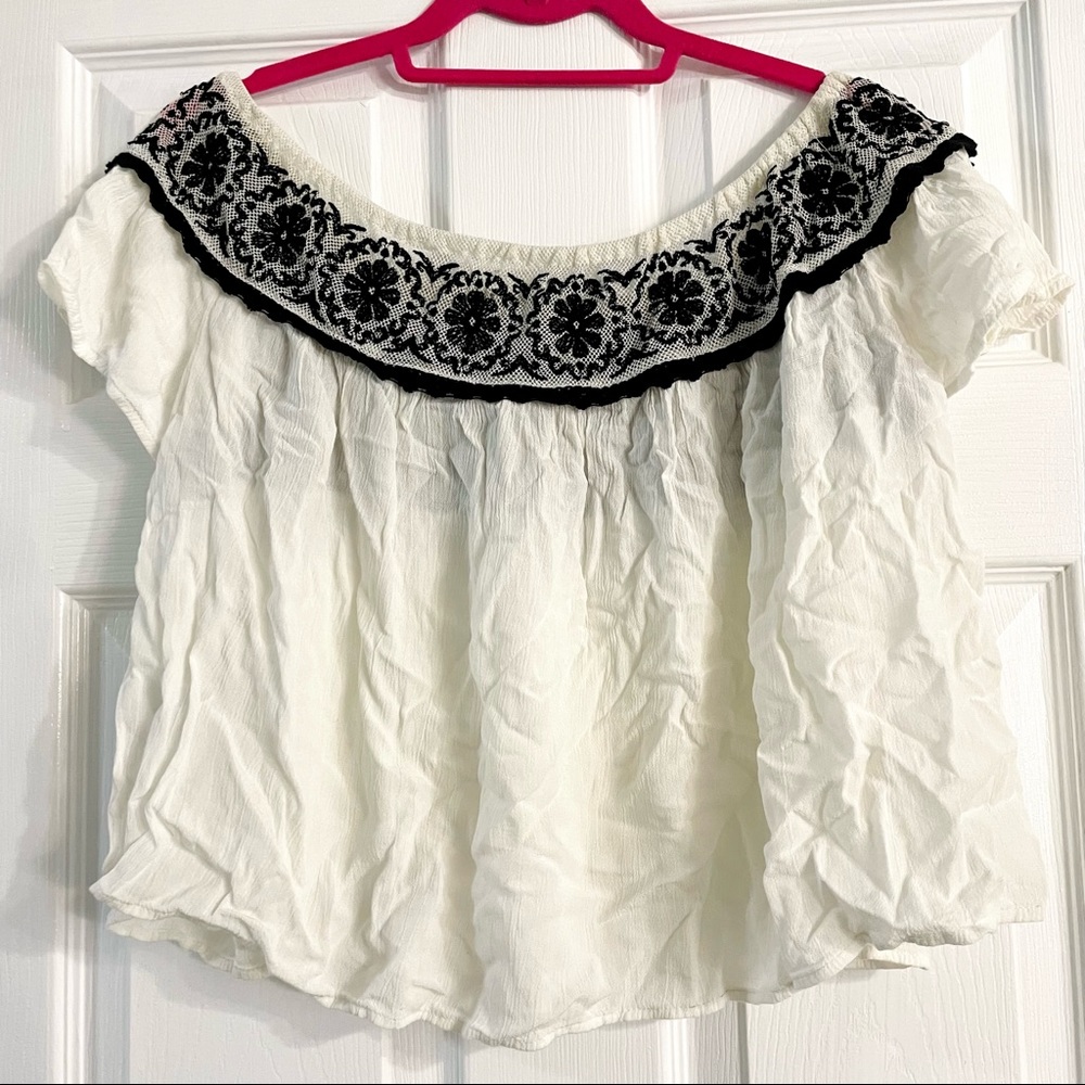 off the shoulder linen top with flower detailing